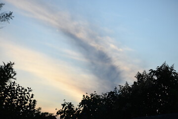 Blue sky with a fleeting cloud
