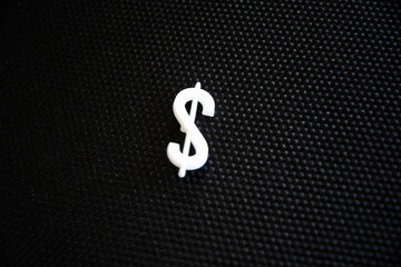 A single dollar sign on a textured surface. Pin Board style. 