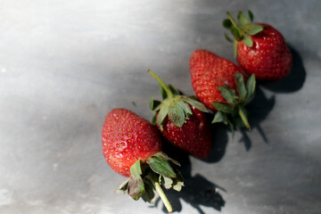 strawberries on a black background
