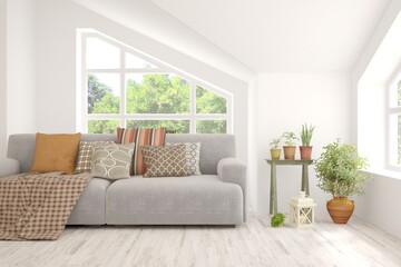 White living room with sofa and summer landscape in window. Scandinavian interior design. 3D illustration