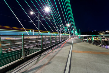 Fototapeta na wymiar Transportation movement at the Tilikum Crossing bridge at dusk in Portland, Oregon