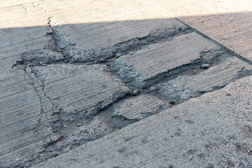 Crack in concrete street textured background. old concrete cement with cracks .