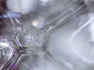 Detail of soap bubbles with sugar. Photography made with a digital microscope.