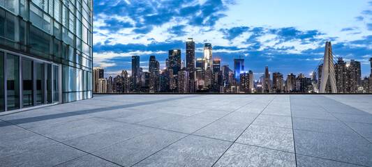 Fototapeta premium Panoramic skyline and modern commercial buildings with empty square floors