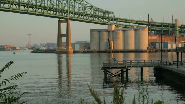 boston tobin bridge from chelsea people on dock