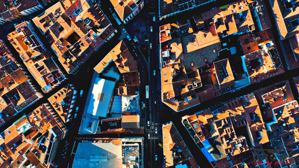 Amazing views of Madrid, Spain detailed architecture from the upside shot by flying drone brown roofs white walls capital metropolis blue sky cars vehicle beatiful buildings patterns