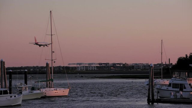 Plane Lands At Boston Logan Airport Viewed From Yacht Club
