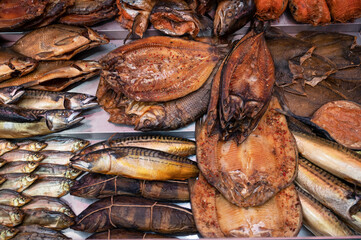 Various smoked fish products. Healthy eating and fish market concept