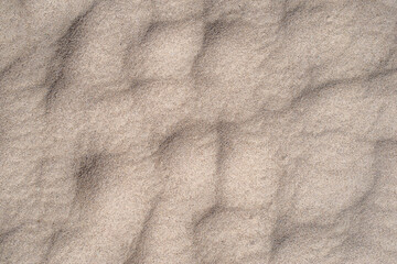 Sand Dune  Dimple Background Pattern. Real Shot of Natural Sand for Subtle Textured Backdrop.