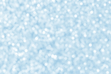 Abstract blue and white bokeh background.  Christmas, New Year and all celebrations backgrounds concept.  Snowfall in the winter background.