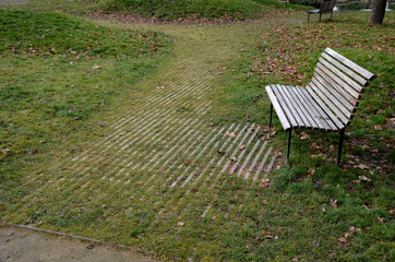 grass grate made of striped tile with holes for soil grass turf. strengthening lawns and car parks with permeable tiles. roof garden sidewalk construction