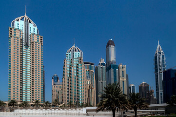 Fototapeta na wymiar city scape of Dubai, tall buildings of uae, skyscrapers of middle east 