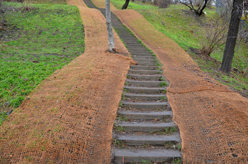 Temporary covering of the lawn sowing fabric to ensure a large slope against erosion. Along the...