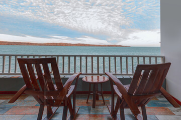 Fototapeta premium Rocking chairs in balcony at the beach - Namibia