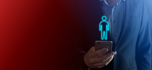 Businessman holds man person icon on dark tone background.HR Human ,people iconTechnology Process System Business with Recruitment, Hiring, Team Building. Organisation structure concept.Neon icon