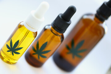 Set of marijuana extract oil and spray in plastic bottles