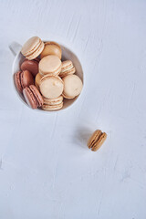 Macaroni cookies on a white background (french macaroons or macaron)