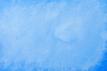 Texture old scratched painted blue wall with scuffs