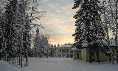 Winter sunset over the house.