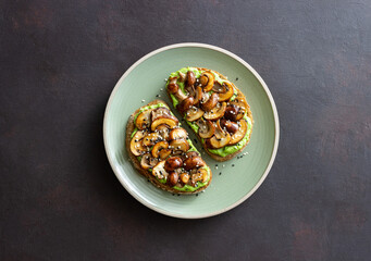 Bruschetta with mushrooms and avocados. Healthy eating. Vegetarian food. Keto diet.