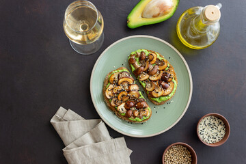 Bruschetta with mushrooms and avocados. Healthy eating. Vegetarian food. Keto diet.