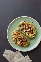 Bruschetta with mushrooms and avocados. Healthy eating. Vegetarian food. Keto diet.