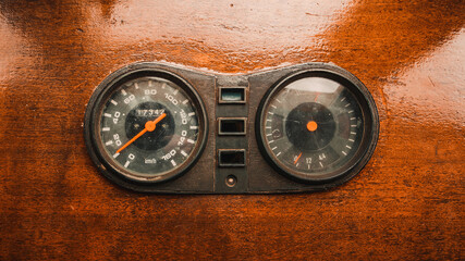 Old odometer and speedometer in kilometers per hour