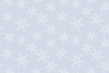 Seamless vector pattern with white snowflakes on a blue background