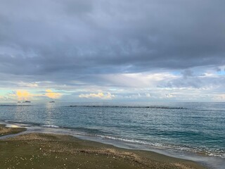 Dark clouds at the sea, evening time, dark seascape
