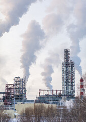 Petrochemical industrial factory of heavy industry, power refinery production with smoke pollution.Thick smoke is coming from the factory's chimney. smoke smog emissions bad ecology aerial photography