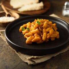 Pasta with red pesto and cheese