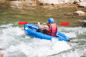 Fototapeta na wymiar inflatable raft extreme sport at mountain river