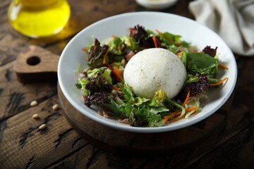 Healthy leaf salad with burrata cheese