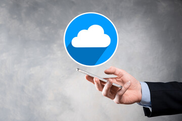 Businessman hold cloud icon.Cloud computing concept - connect smart phone to cloud. computing network information technologist with smart phone.Big data Concept.flat icons with long shadows