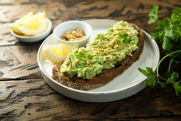 Traditional healthy avocado toast with peanut