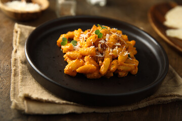 Pasta with red pesto and cheese