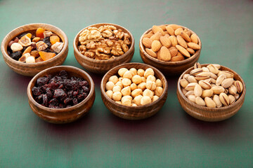 nuts and dried fruits in bamboo plates