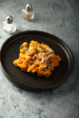 Pasta with red pesto and cheese