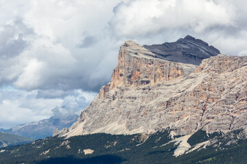 Dolomites cliff view with characteristic rock color and texture (Italian Alps, summer)