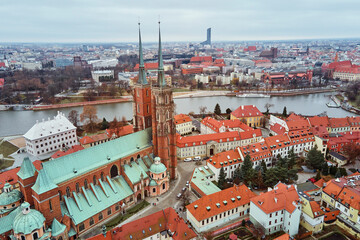 Obraz premium Aerial view of Wroclaw cityscape panorama in Poland. Cathedral of St. John on Tumski island, bird eye view