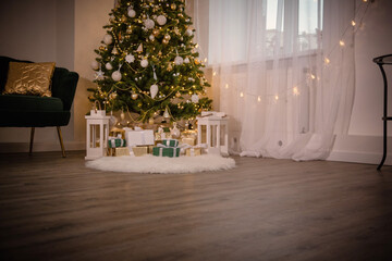 Various Christmas gifts under the tree