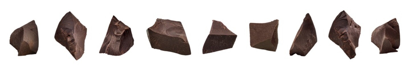 Cracked chocolates  broken chocolate chips or chocolate parts pieces from top view  isolated on...