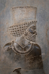 Ruins, statues and murals of ancient persian city of Persepolis in Iran. Most famous remnants of...