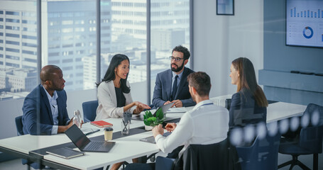 Office Conference Room Meeting: Diverse Team of Top Managers Talk, Brainstorm, Use Tablet, Celebrate and Applaud Successful Solutions. Asian Businesswoman Presenting Investment Strategy to Investors