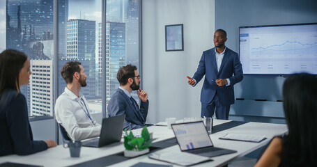 Diverse Office Conference Room Meeting: Charismatic Black Digital Entrepreneur Presents e-Commerce...