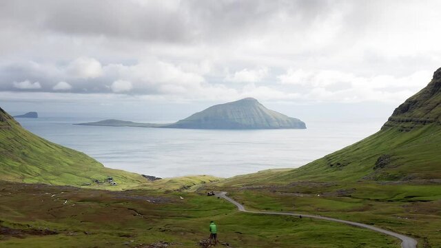Aerial view of wilderness nature,islands, ocean, green mountain and rock cliffs.Impressions of the fascinating archipelago of the Faroe Islands in the North Atlantic Ocean