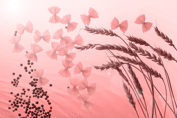 wheat and pasta on pink background 