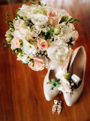 Wedding accessories. set, shoes, earrings, boutonniere, perfume, wedding rings