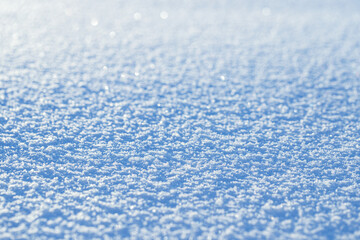 Snow background close-up. Selective focus.