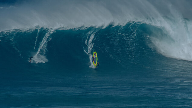 Sport photography. Jaws swell on International surfing event in Maui, Hawai 2021 December.